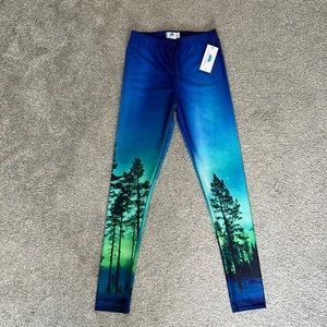 Brand New with Tags. Size Medium